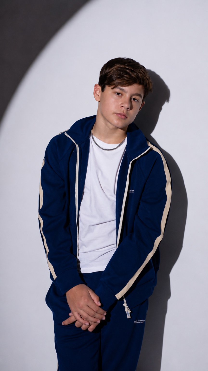 Singer and songwriter Lucas Knight photographed under a cinematic spotlight