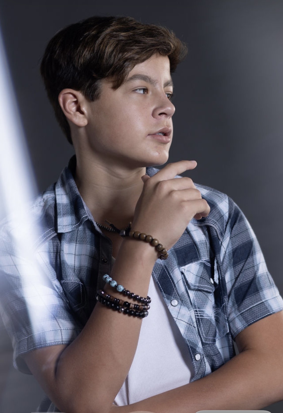 Lucas Knight in a moody studio portrait